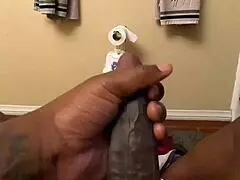 Amateur Masturbates Big Black Cock in Bathroom