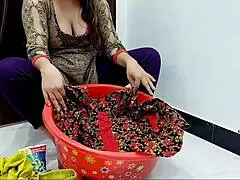 helping desi stepmom wash clothes before intimate moment