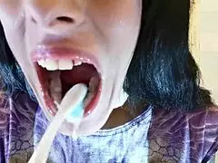 In the early morning, a goth mistress performs a mouth and teeth fetish pov toothbrush after a goodmorning blowjob