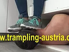 I'm your goddess, slave, trampling you with my sneakers while you're bound in bondage.