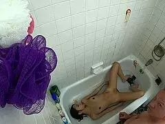 What is Candy Cruise doing in the bathtub?