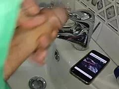 Gardener Finds Boss's iPhone, Discovers XVideos Page, Masturbates in Bathroom While She Washes Dishes