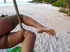 shibari on public beach with lordshibarifloripa