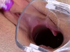 anita pearl teases her g-spot with a glass dildo