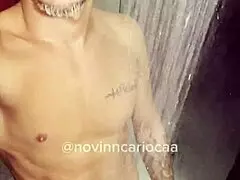 Brazilian twink masturbates in shower fully naked
