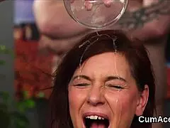 watch this naughty bombshell swallow every drop of cum on her face?