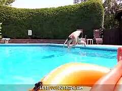This busty fit brunette just dives into fucking her muscular neighbor right in the outdoor pool.