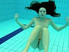 katy soroka looks stunning in red swimwear by the shower