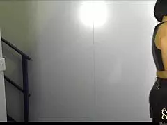 Sahara Knite endures cage strapon spanking.