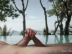 my man jerks his fat dick by the pool, right in public