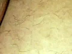 My wife is asleep in bed. She looks peaceful after a long day.