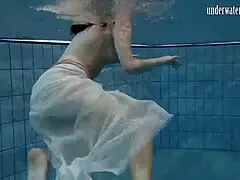 Dark-haired teen Andrea floats with the hottest ass in the pool