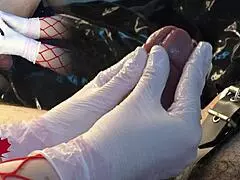 Mistress uses white gloves to masturbate my cock and dilator for cum.