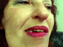 Giantess Dawnskye1962 smokes a cigarette before battling gummy bears in wild fetish fun