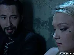 suspended blonde undergoes deep throat fucking