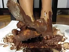 my feet with varnished nails all covered in chocolate cream, a goddess fetish delight