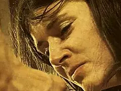 In vintage london's swinging sixties, a hairy british woman bound in rope bondage gets whipped