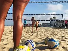 Hey, check this big booty African babe spiking on the beach!