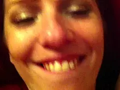 A redhead amateur engages in passionate sex on the couch.