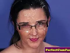 Cumshot whore handles bukkake in wild group blowbang. British babe in stockings craves jizz.