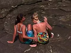 Enjoying Hard Cuddles On The Rock By The Sea
