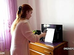 Beautiful naked redhead karolinka applies makeup while posing