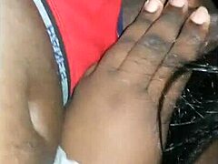 she's giving this ebony dude a sloppy deepthroat blowjob