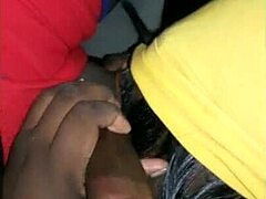 she's giving this ebony dude a sloppy deepthroat blowjob