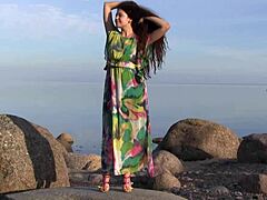 Oh man, Norma A is totally getting into this sensual solo masturbation session by the Baltic sea in the evening