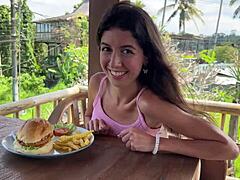 Cute brunette teen flashes small tits and gets cum on face after pov blowjob in public restaurant toilet