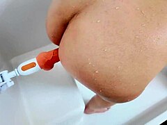 I felt a rush of shock and arousal catching my wife masturbating in the shower with her massive dildo