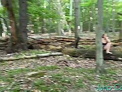 Hey, check out this sneaky view of a sexy girl getting off with her toy deep in the woods