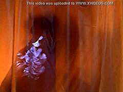 In a steamy Smallville episode, blonde actress Tania Saulnier strips nude for her sexy shower scene, revealing alluring curves.