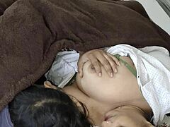 Big tits Indian step mom shares bed with step son at home for family bonding.