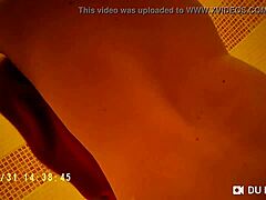 Spy camera captures nude tits in steamy shower scene