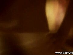 Exotic brunette teases with nude striptease and seductive dancing in erotic Indian style from New Delhi