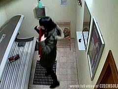 i love spying on this european brunette fingering her pussy in the tanning bed