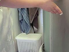 stepmom caught her son in the shower and decided to help him jerk off until he came on her tits