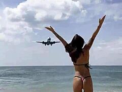 Monika Fox Poses Gracefully in Pink Bikini on Sunny Beach