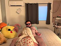 This chubby Latino couple gets intimate as the wife sucks and rides her husband's cock in bed