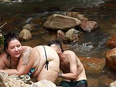 Oh wow, banging this hung Colombian guy in the river outdoors feels so wild! 🍆💦