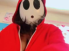 In a whimsical twist, Shyguy suddenly grew big massive boobs. The cute nerd explored self sucking his huge saggy tits curiously.