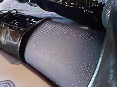 total black with fishnets pantyhose and boots over the knee. hey, check out this all-black outfit with fishnets and knee-high boots