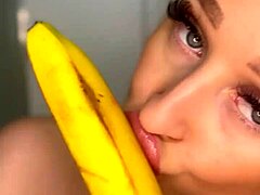 I feel so horny as this college girl sucks eagerly on that big banana