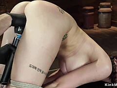 brunette hogtied suspended whipped gagged in rough bdsm bondage