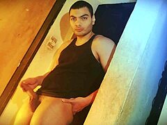 struggling to lift this sexy muscular bodybuilder's huge cock against the wall