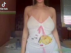 who wouldn't explode watching this busty brunette's huge natural tits bounce