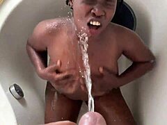 Two ebony lesbians spread for big black cock, then pee play in wild bisexual threesome frenzy