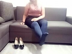 a beautiful woman unwinds alone at home