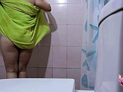 watching stepdaughter's wet hairy pussy in shower makes me throb with need